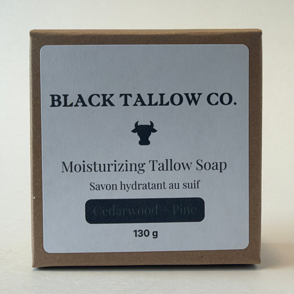 A square kraft paper box of Black Tallow Co. Moisturizing Tallow Soap, featuring a white label with black text and a cow logo, set against a plain light background.