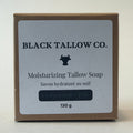 A square kraft paper box of Black Tallow Co. Moisturizing Tallow Soap, featuring a white label with black text and a cow logo, set against a plain light background.