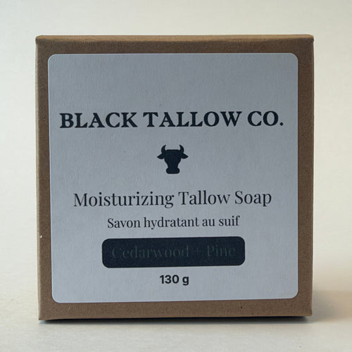 A square kraft paper box of Black Tallow Co. Moisturizing Tallow Soap, featuring a white label with black text and a cow logo, set against a plain light background.