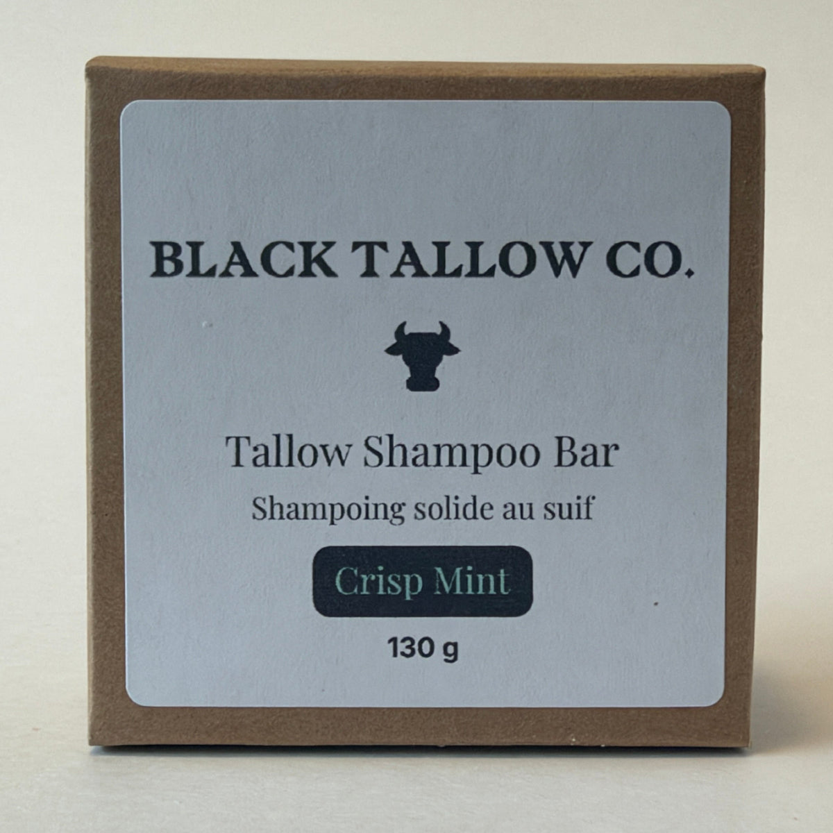 A square brown cardboard box for Black Tallow Co. Tallow Shampoo Bar in Crisp Mint scent, featuring a light gray label with black text and a black bull logo.